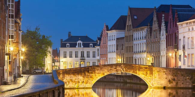 Holland Belgium 2024 Amsterdam Antwerp River Cruise Viking River   Bruges Canal Bridge Night 650x325 Tcm23 103144 